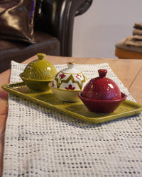 Three Sugar Bowls on Khaki Tray